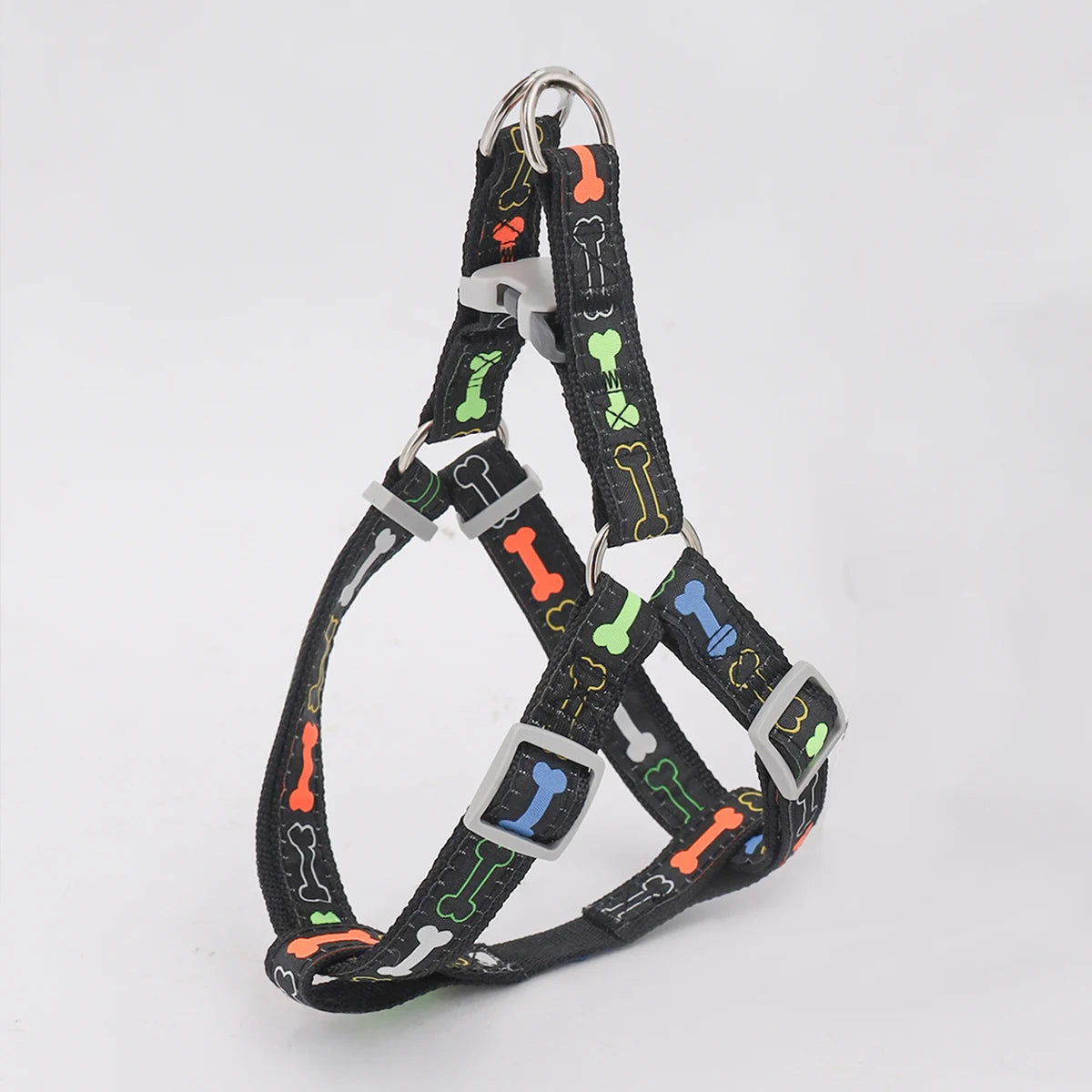 A colorful bone tripod pet dog harness for indoor and outdoor use