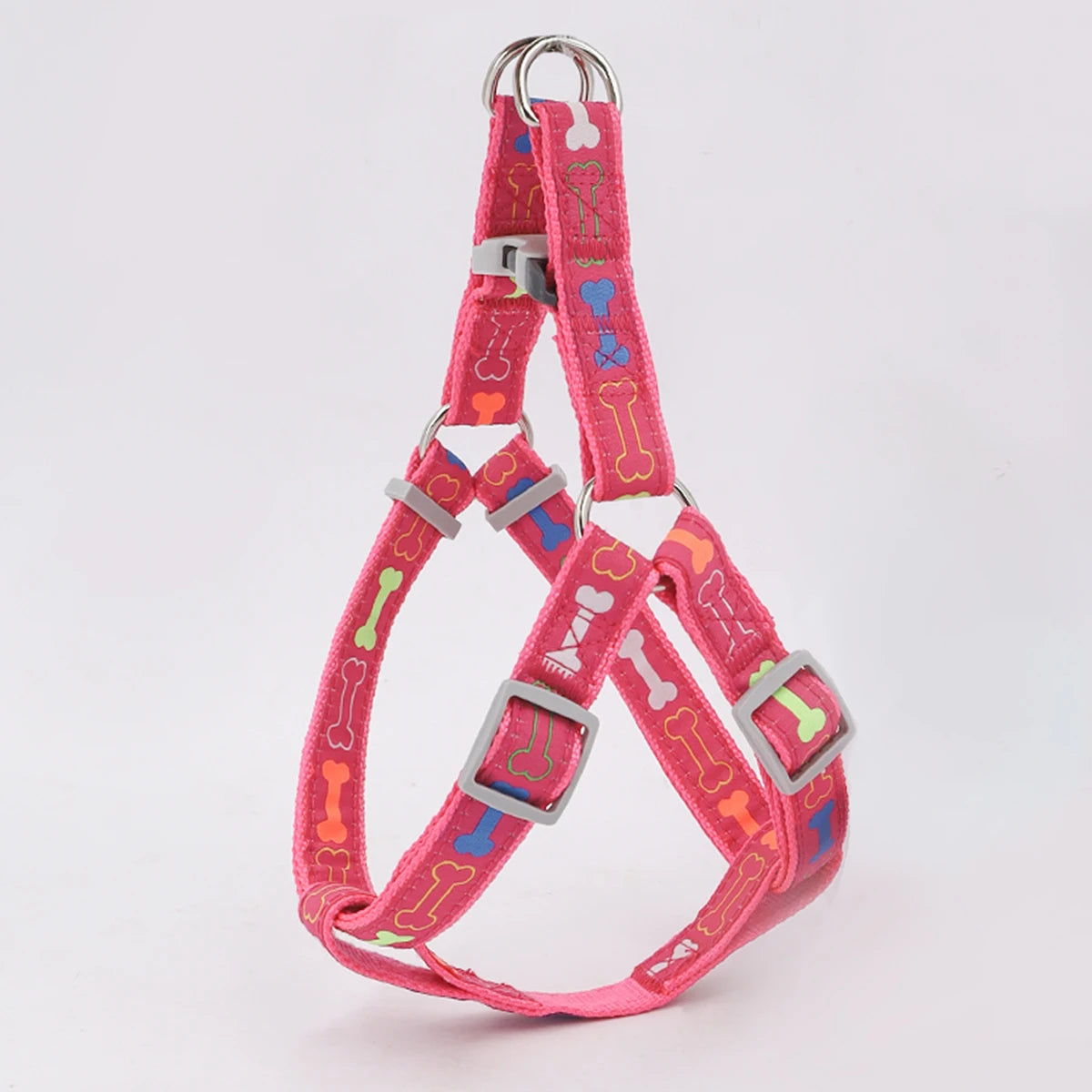 A colorful bone tripod pet dog harness for indoor and outdoor use